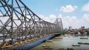 A large steel bridge with multiple lanes for vehicles and a river below. - Super Collection O City Center 2 (Barasat)