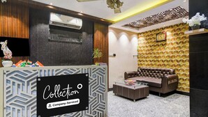 A reception area with a sign reading 'Collection' and a sofa. - Super Collection O City Center 2 (Barasat)