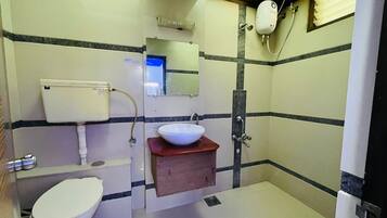 Shower, free toiletries, slippers, towels