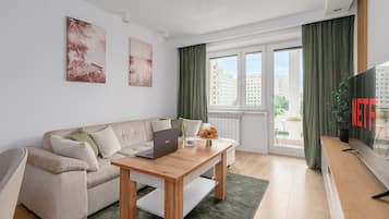 Premium bedding, laptop workspace, blackout curtains, iron/ironing board