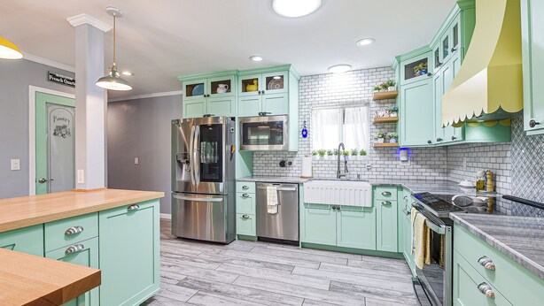 A kitchen with teal cabinets, stainless steel appliances, and a wooden countertop. - 7 Mi to Saguaro Natl Park! Mtn-view Haven w/ Pool (Tucson)