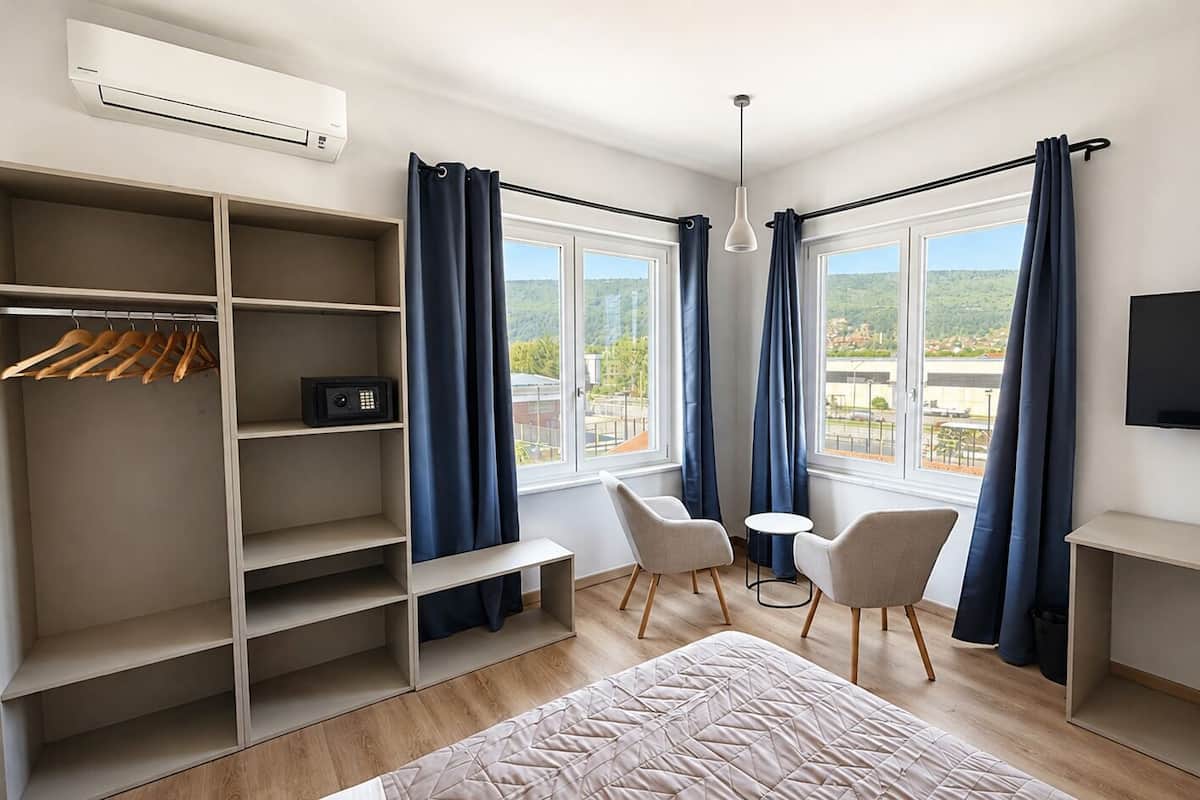 Deluxe Double Room, Mountain View | Premium bedding, down comforters, memory foam beds, in-room safe
