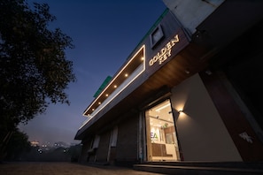 A building with a sign that reads 'Golden Key.'