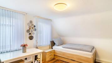 2 habitaciones, tabla de planchar con plancha, wifi y ropa de cama