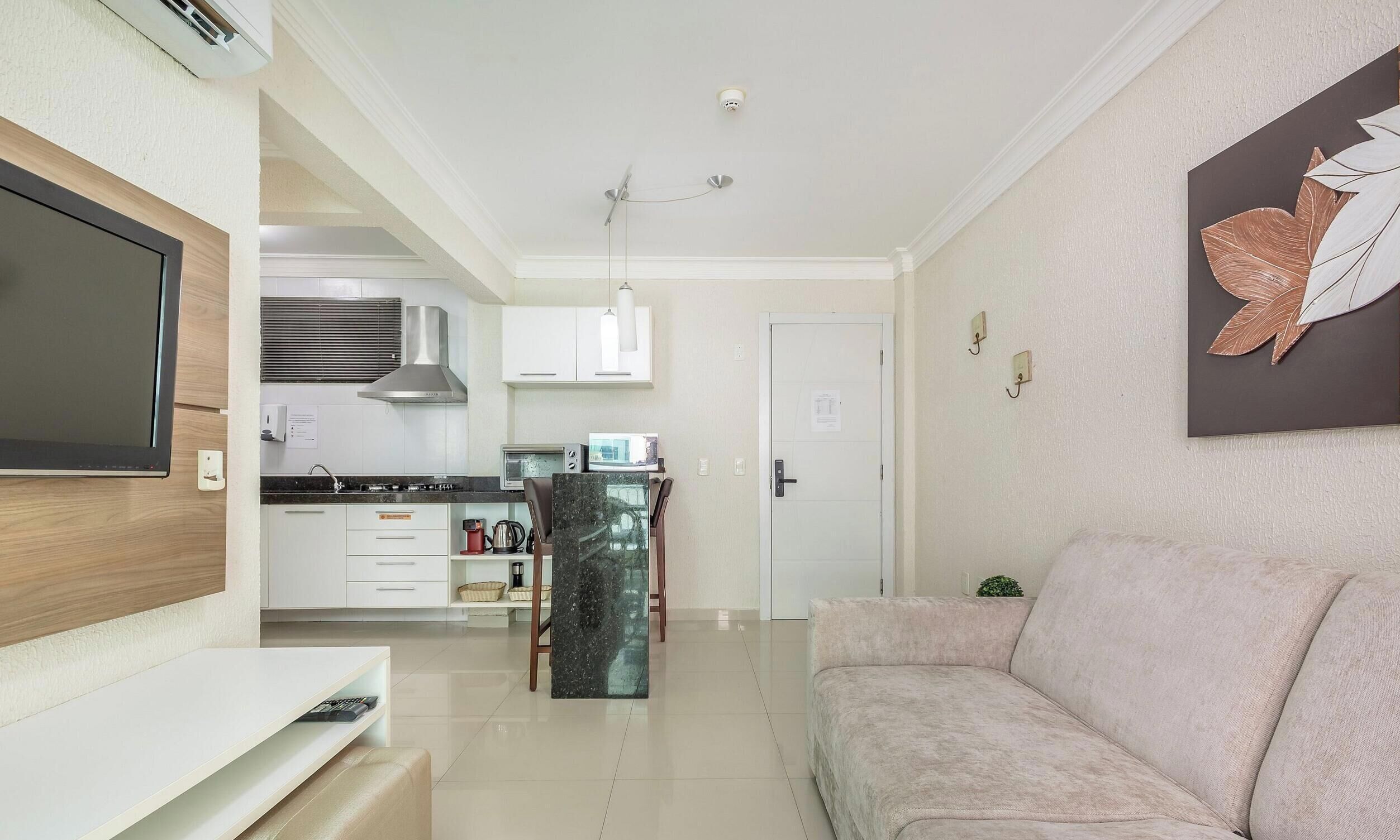Basic Apartment | Living area | 40-inch TV with digital channels