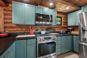 Coffee/tea maker, fridge, microwave, oven