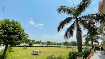 Economy Double Room, Garden View | Outdoor dining