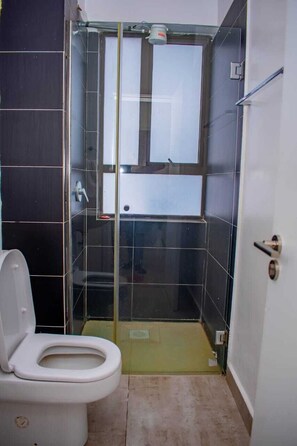 Classic Apartment, Balcony | Bathroom | Shower, free toiletries, slippers, towels - The Enkang Urban Escape (Nairobi)