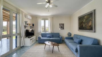 Comfort Villa, Garden View | Living area | 40-inch flat-screen TV with digital channels