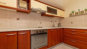 Apartment (A3) | Private kitchen | Espresso maker, fridge, oven, stovetop - Apartments Dream (Brela)