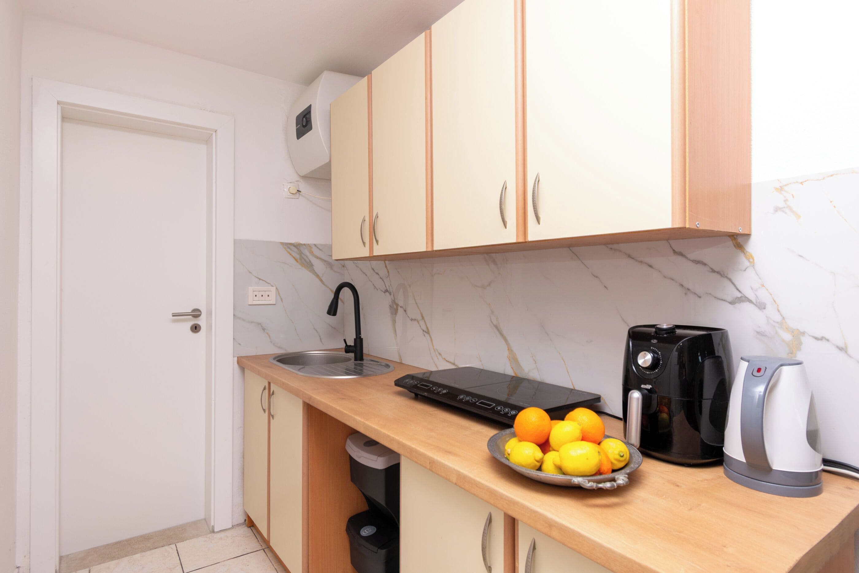 Apartment (A4) | Private kitchen | Espresso maker, fridge, microwave, stovetop