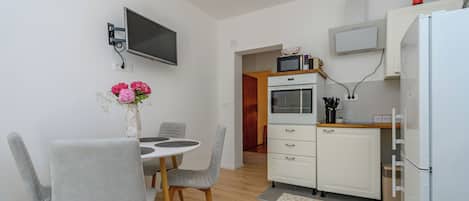 Apartment (A2) | Private kitchen | Espresso maker, fridge, microwave, oven