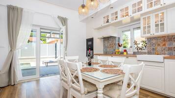 Apartment (A1) | Private kitchen | Espresso maker, fridge, oven, stovetop