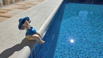Outdoor pool, pool umbrellas, sun loungers