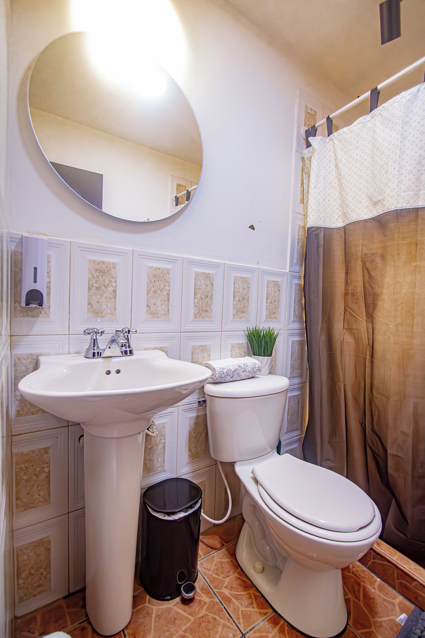 Shower, towels, soap, toilet paper