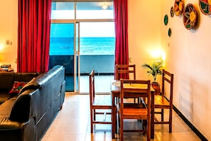 Living area - Ocean-view Balcony - Uroa 2 Bedroom Beachfront apt (Uroa)