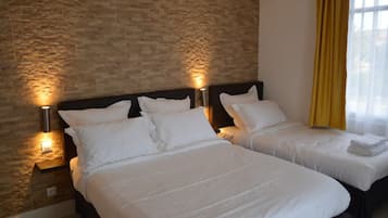 Classic Triple Room, Balcony, Garden View | In-room safe, desk, blackout curtains