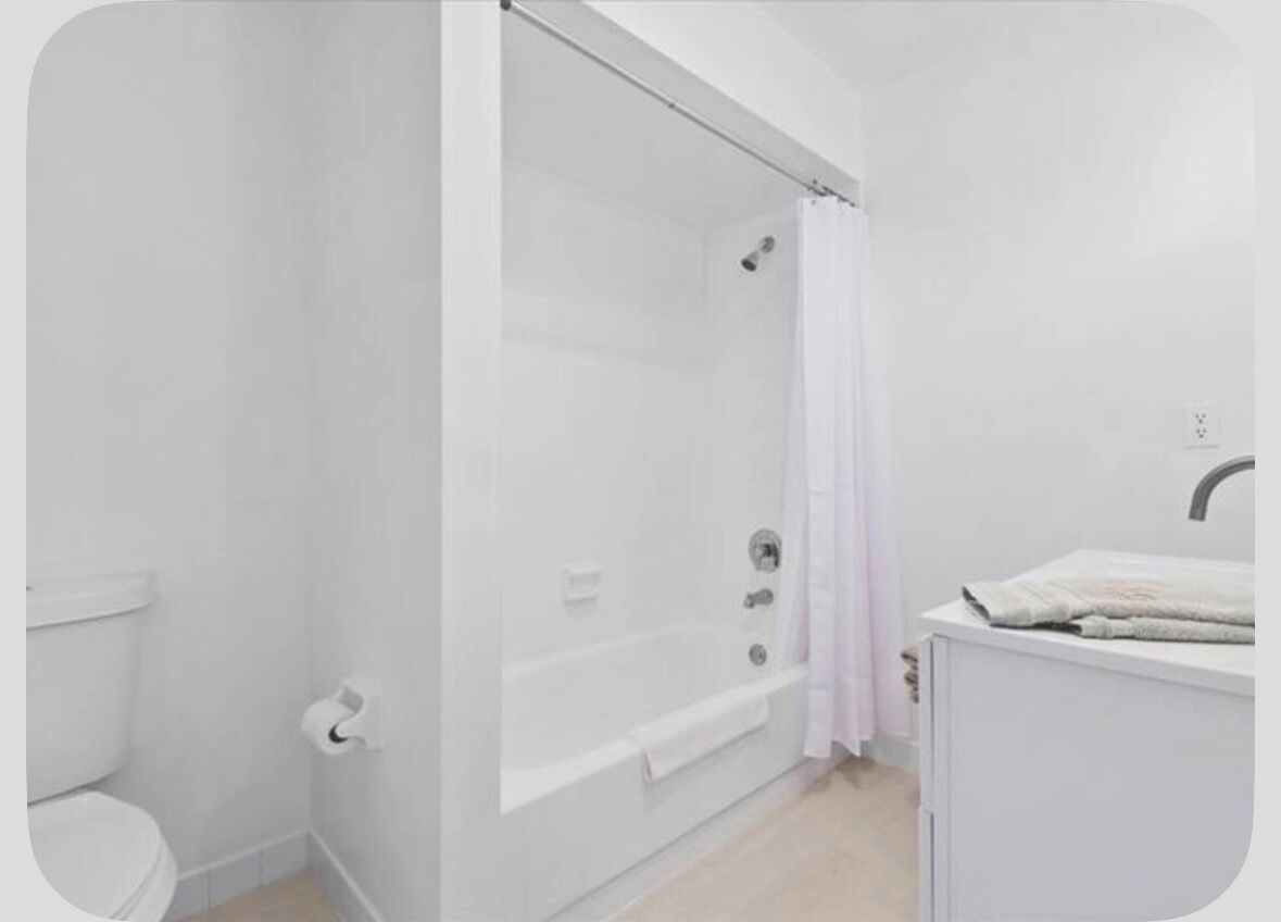 Hair dryer, towels, soap, toilet paper