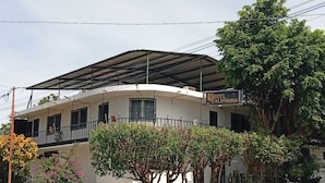 A two-story building with a sign reading 'HOTEL CALIFORNIA.' - Hotel California Santa Ana (Santa Ana)