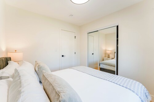Luxury Designer Home with Spa Bathrooms • King Bed • AC • Minutes to Downtown