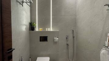 Apartment, 1 King Bed | Bathroom | Shower, free toiletries, slippers, towels