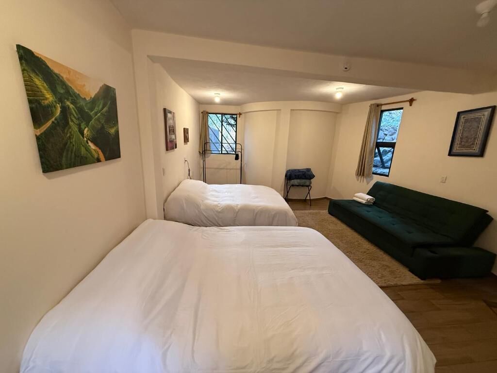 Habitaci ón triple familiar, vistas al jardín | Wifi gratis