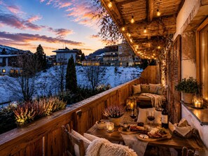 Outdoor dining - apartment combination near the mountain lifts (Kirchberg in Tirol)