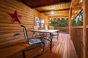 Outdoor dining - Large true cypress log cabin with year round private pool. Shelbys Place (Sevierville)