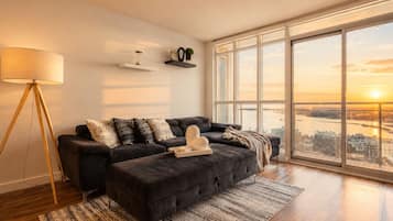 City Condo, Balcony, Lake View | Living area | 50-inch Smart TV with digital channels, Netflix, streaming services