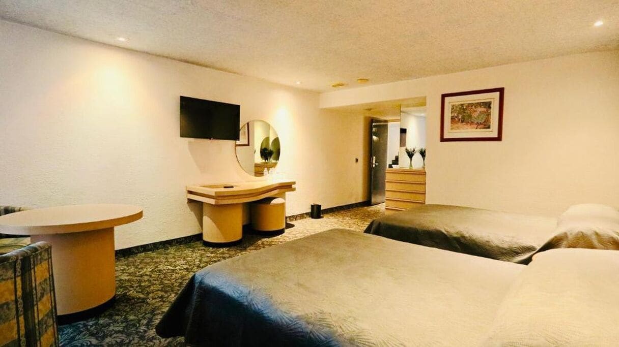 Habitación cuádruple básica, 2 camas Queen size, para no fumadores | Spa