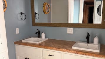Jetted bath, hair dryer, towels, soap