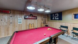 A pool table with a red felt surface, surrounded by wooden walls with a wooden ceiling. - Woodland 2BR Mountainview Dog Friendly - Deck (Leavenworth)
