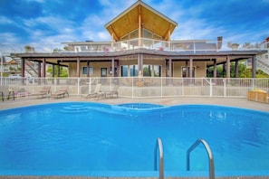 A two-story building with a swimming pool in the foreground. - Contemporary 5BR - Private Pool - Hot Tub (Manson)