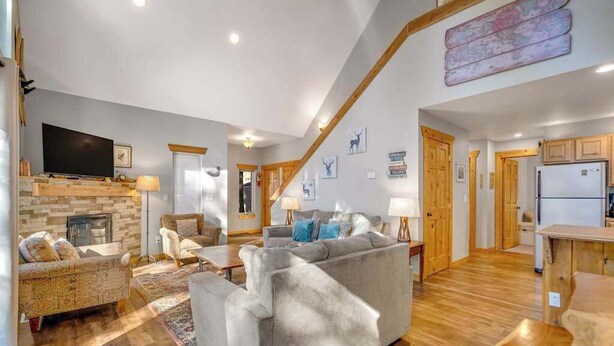 A spacious living area with a fireplace, comfortable seating, and a television. - Light-filled 3BR Dog Friendly - Deck (Leavenworth)