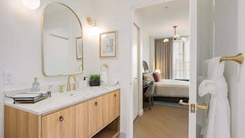 Shower, hair dryer, towels, shampoo