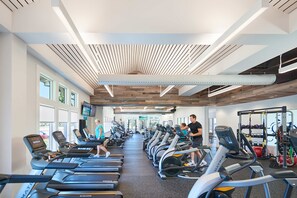 A gym with treadmills, stationary bikes, and weight machines. - Bayside Resort - 36620 Day Lily Pkwy (Selbyville)