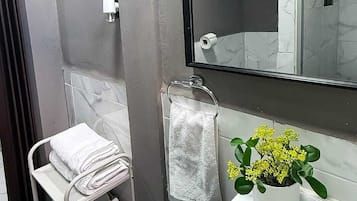 Hair dryer, towels, soap, toilet paper