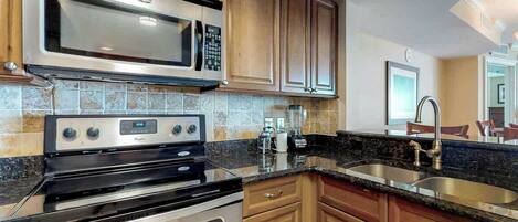 Coffee/tea maker, fridge, microwave, oven