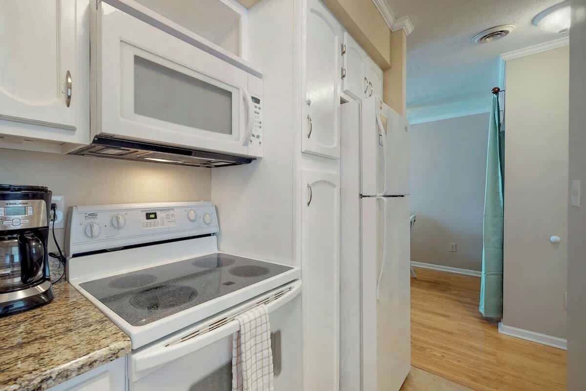 Coffee/tea maker, fridge, microwave, oven