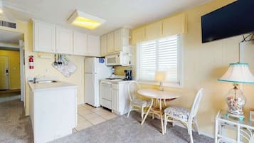 Coffee/tea maker, fridge, microwave, oven