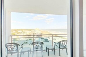A balcony with a view of the city and beach. - Bahama Sands Unit 0701 (North Myrtle Beach)