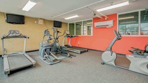 A fitness room with treadmills, ellipticals, and a stationary bike. - Bahama Sands Unit 1002 (North Myrtle Beach)