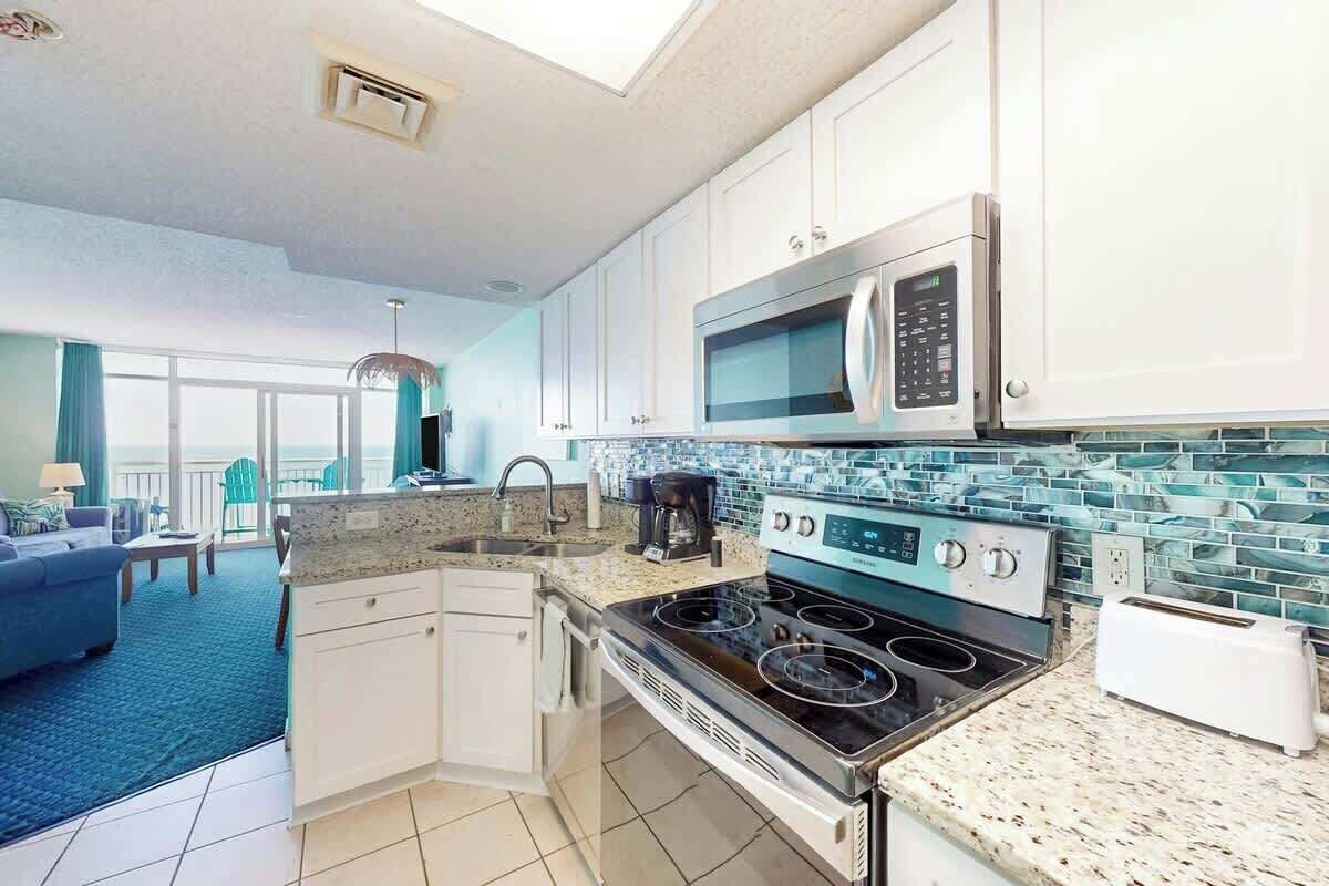 Coffee/tea maker, fridge, microwave, oven