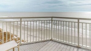 A balcony with a view of the beach and ocean. - Bay Watch Resort 1612 (North Myrtle Beach)