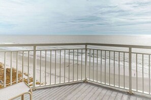 A balcony with a view of the beach and ocean. - Bay Watch Resort 1612 (North Myrtle Beach)