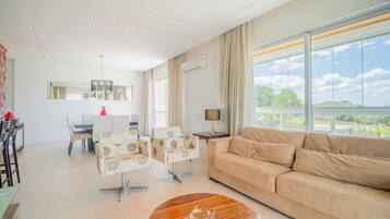 Basic Apartment | Living area | 40-inch TV with digital channels