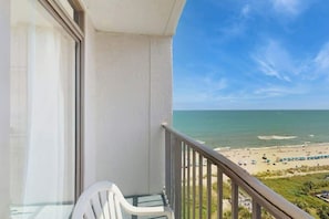 A balcony with a view of the beach and ocean. - Ocean Park Resort 1224 (Myrtle Beach)