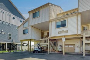 A multi-story building with a sign reading 'Beach Villas.' - Perfect Harmony Retreat (North Myrtle Beach)