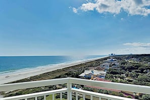 A coastal view with a beach, ocean, and a residential area with houses. - Dunes Village Resort 1053 (Myrtle Beach)