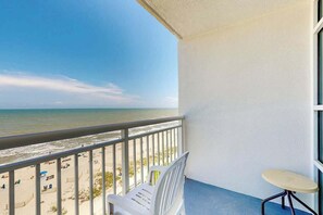 A balcony with a view of the beach and ocean. - Carolinian Beach Resort 0730 (Myrtle Beach)